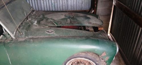 Two classic MG MGA Roadsters are being offered in this auction. These highly collectible British sports cars present a rare opportunity for restoration enthusiasts and vintage auto collectors.Vehicle #1 – A complete MGA Roadster in barn-find condition. This car has been stored for decades and retains its original styling, wire wheels, and convertible top. It will require a full restoration but offers an excellent foundation for bringing a piece of British motoring history back to life.Vehicle #2 – A second MGA Roadster offered primarily for parts. This companion car provides valuable original components including body panels, trim, wheels, and other hard-to-source items essential for a restoration project.These MGAs are sought-after examples of mid-century open-top motoring, celebrated for their timeless design and spirited driving experience. Offered together in consecutive lots, this package is perfect for the restorer, collector, or investor looking to revive or preserve a piece of automotive history.