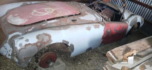 Two classic MG MGA Roadsters are being offered in this auction. These highly collectible British sports cars present a rare opportunity for restoration enthusiasts and vintage auto collectors.Vehicle #1 – A complete MGA Roadster in barn-find condition. This car has been stored for decades and retains its original styling, wire wheels, and convertible top. It will require a full restoration but offers an excellent foundation for bringing a piece of British motoring history back to life.Vehicle #2 – A second MGA Roadster offered primarily for parts. This companion car provides valuable original components including body panels, trim, wheels, and other hard-to-source items essential for a restoration project.These MGAs are sought-after examples of mid-century open-top motoring, celebrated for their timeless design and spirited driving experience. Offered together in consecutive lots, this package is perfect for the restorer, collector, or investor looking to revive or preserve a piece of automotive history.